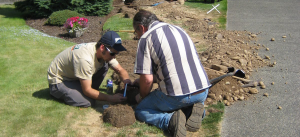 a team doing Antioch Sprinkler Repairs on a leaky delivery line 